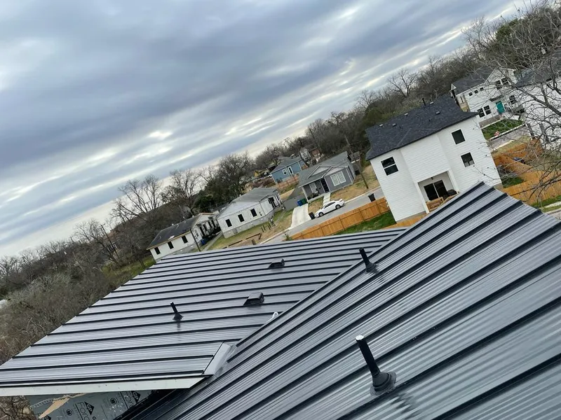 Standing seam metal roof panels with vents for Skylight Repair in Clarendon Hills